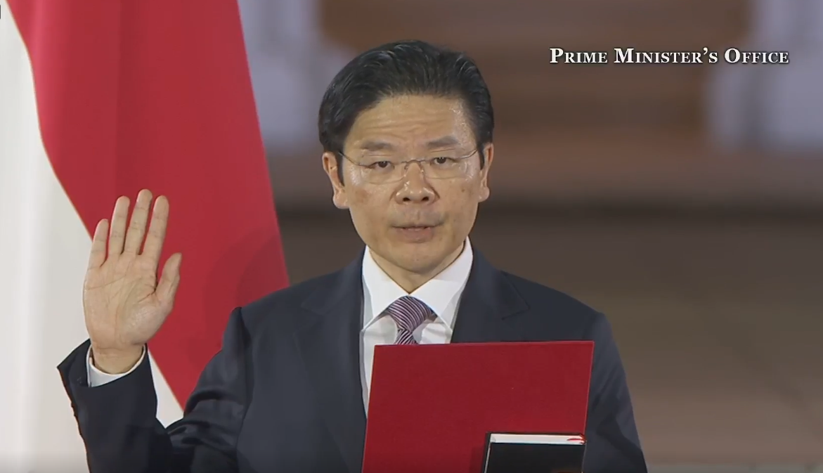 Lawrence Wong taking oath of allegiance solo screenshot Facebook Lawrence Wong